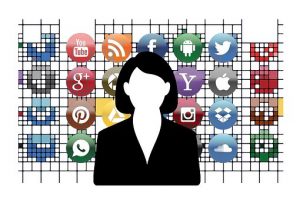 Female figure in front of social media icons