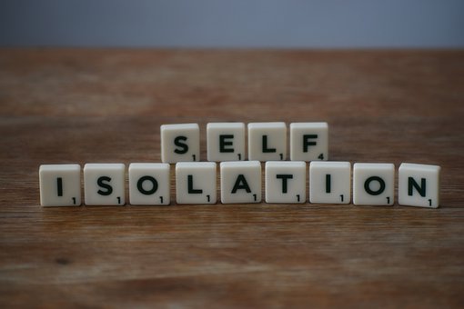 What happens if an employee has to self-isolate? - scrabble tiles