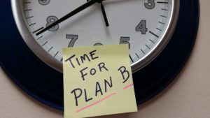 What Plan B Involves for Employers- a clock with a sticker saying time for plan b
